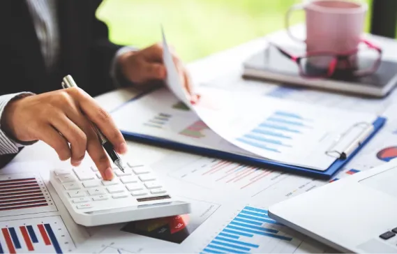 How Do Taxes and Fees Affect Real Estate Investment Returns in Dubai?